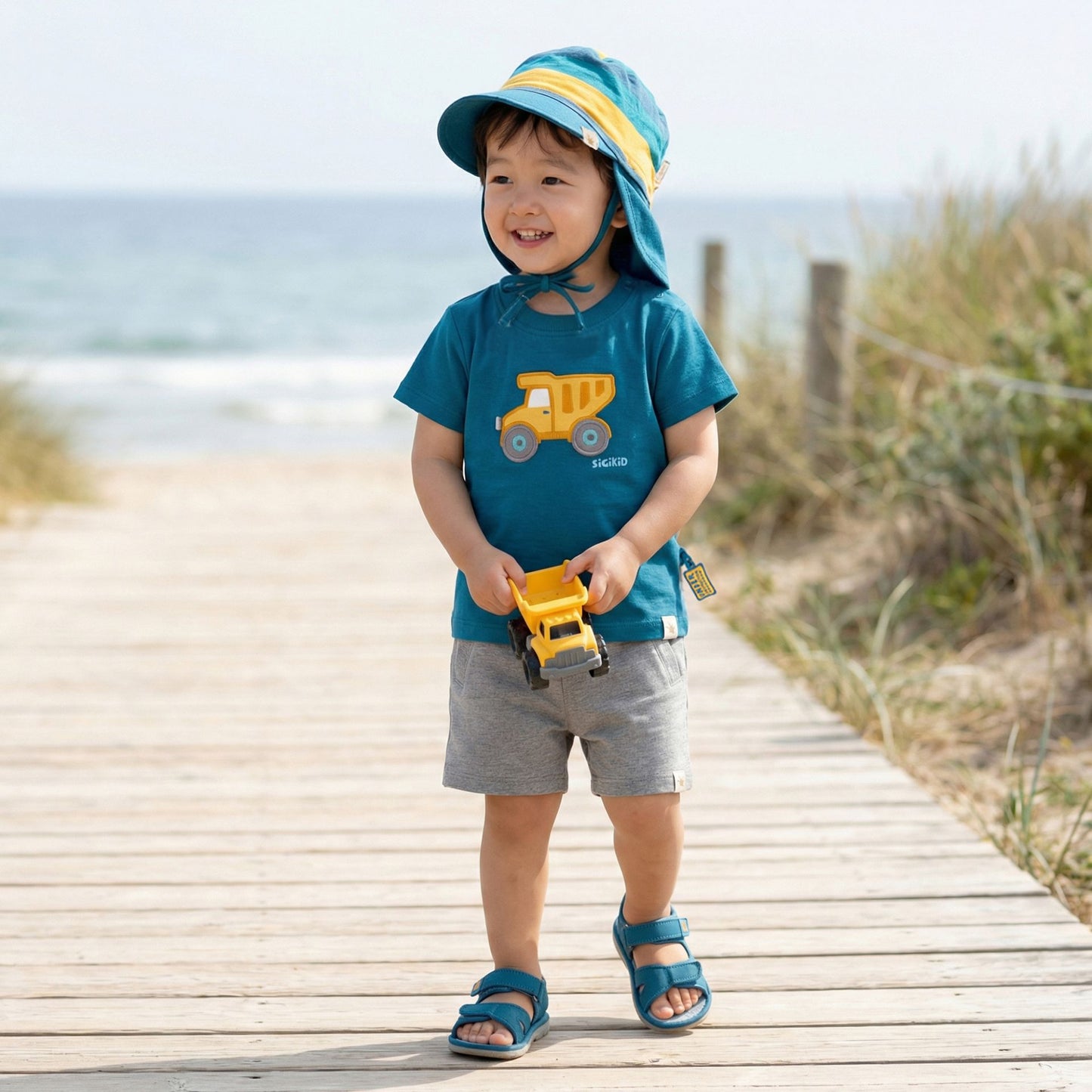 Sigikid Baby Sonnenhut Petrol-Gelb mit Nackenschutz